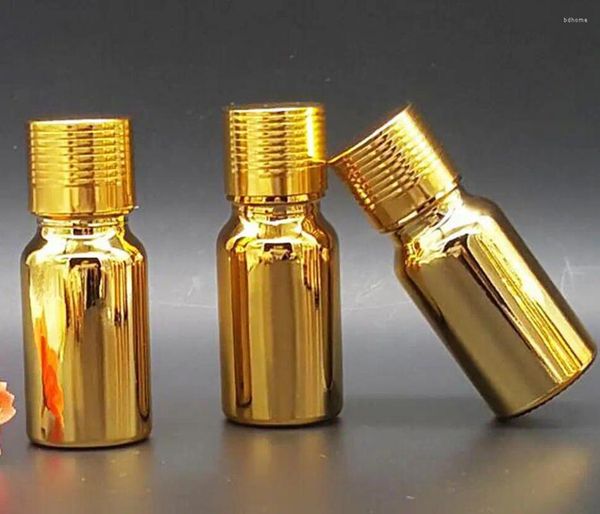 Botellas de almacenamiento Alto grado 10 ml Muestra de aceite esencial Botella Venta al por mayor Pequeño vidrio dorado vacío 100 piezas