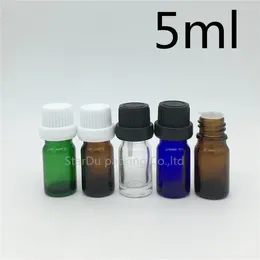 Bouteilles de rangement de haute qualité 10pcs / lot 5 ml de flacons de bouteille en verre bleu huile essentielle de parfum 5cc Cap