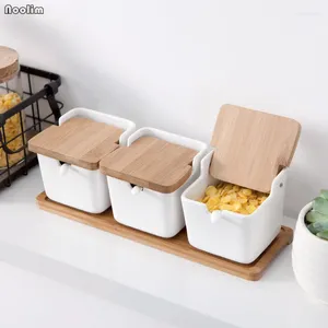 Bouteilles de rangement pots d'assaisonnement domestiques simples thé de sucre en sel blanc avec couvercle en bois en céramique outils de cuisine