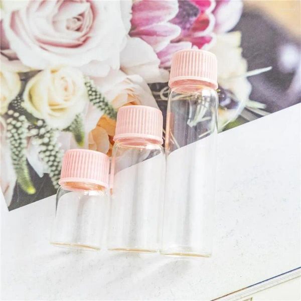 Botellas de almacenamiento Jares de vidrio hialino Cubierta de plástico rosa 2 ml 4 ml 6 ml de diámetro vítreo de 16 mm mini manualidades transparentes de viaje viales de perfume 100pcs