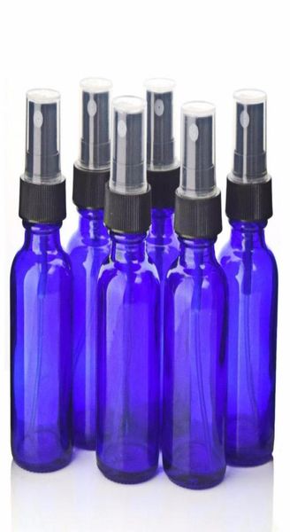 Bouteilles de rangement Jars 30 ml Bouteille pulvérisée Verre bleu cobalt W Sprayers de brume fine noire pour les huiles essentielles Nettoyage de maison 1 oz3702544