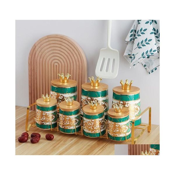 Bouteilles de stockage Pots Pot hermétique en céramique avec couvercle en bois Boîte de cuisine Thé Café Grain Réservoir Distributeur de grains Produits ménagers Drop Dhty9