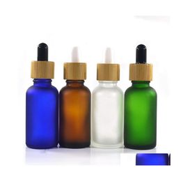 Bouteilles de stockage Bocaux Flacon compte-gouttes en verre d'huile essentielle avec couvercle en bambou Sérum Givré Vert Bleu Ambre Clair 10Ml 15Ml 20 30Ml 50M Otfgb