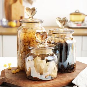 Bouteilles de stockage Bocaux Bocal de stockage en verre en forme de coeur Boîtes de thé scellées Maison Grande capacité Candy Nut Coffee Bean Storage Jar Kitchen Storage Container 230217