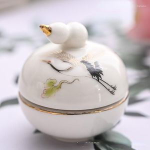 Bouteilles de stockage Mini pot de traçage en or Bouchon à vis en céramique de style chinois Le thé en courge peut contenir un pot liquide.