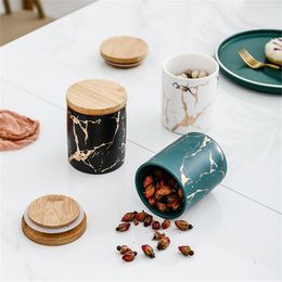 Bouteilles de stockage Réservoir en céramique nordique épices pot café peut cuisine organisateur récipient alimentaire bouteille de bonbons avec couvercle rond scellé thé Caddy