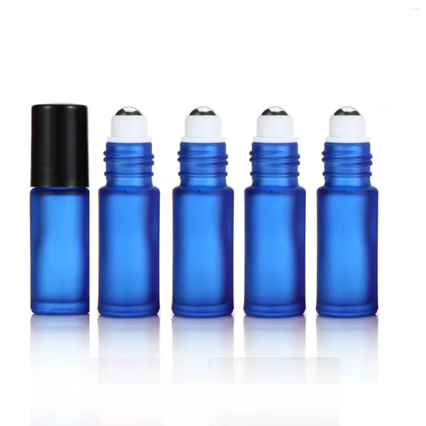 Botellas de almacenamiento Recargables Gruesas 5 ml Rollo vacío en botella de vidrio azul esmerilado para aceite esencial Perfume Bola de rodillo de metal 800 unids / lote