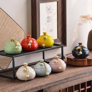 Bouteilles de rangement Style rétro sac de bénédiction rouge boîte en céramique petit Pot à épices de thé Pu'er Portable Pot hermétique chinois