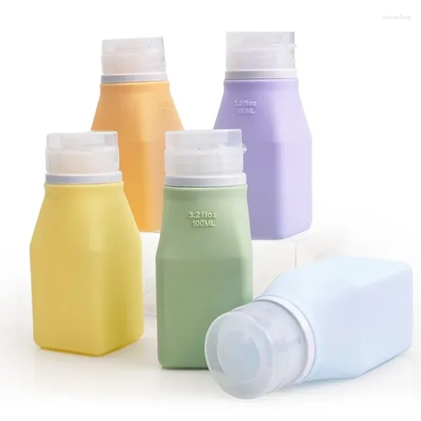 Botellas de almacenamiento Essentials de viaje 100 ml Botella cuadrada de silicona recargable Loción para el cuidado de la piel Conjunto de embalaje portátil de negocios