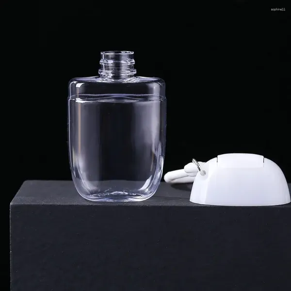 Botellas de almacenamiento Tapa abatible de viaje Plástico vacío con gancho Botella recargable transparente Envase cosmético Jabón de manos Spray