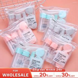 Bouteilles de rangement de voyage en bouteille de maquillage en huit pièces Lotion Spray Bottle Cream Box est portable et peut être prise à bord avec un sac