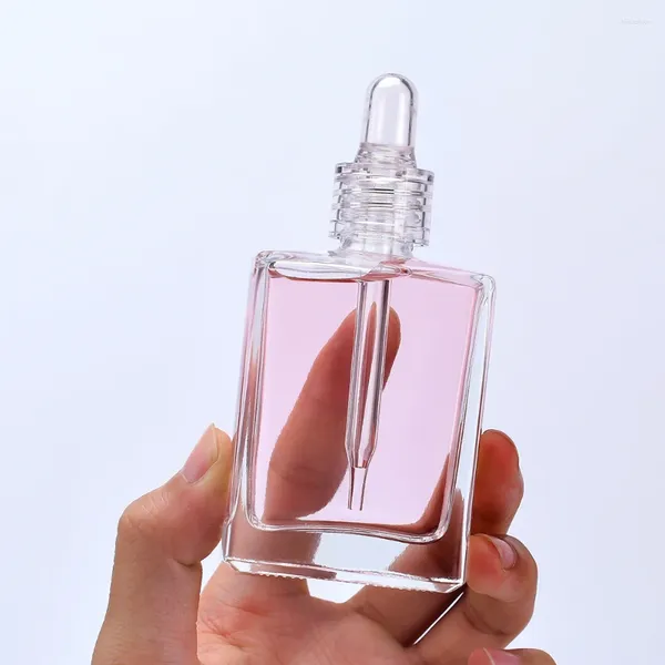 Botellas de almacenamiento Tendencias al por mayor 15 ml 30ml 50ml 100 ml de paquete cosmético forma cuadrada de suero transparente de aceite esencial de vidrio botella
