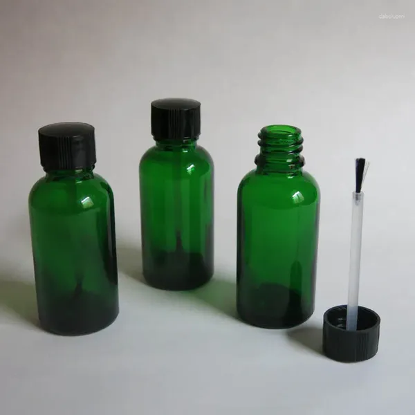Bouteilles de rangement en gros de 30 ml de brosse en verre vert bouteille d'huile d'essetialité avec sérum