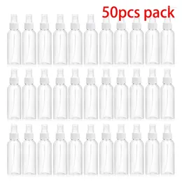 Bouteilles de stockage en gros 50pcs 100ml bouteille de pulvérisation à brume Fine clair voyage étanche pour les conteneurs cosmétiques de maquillage