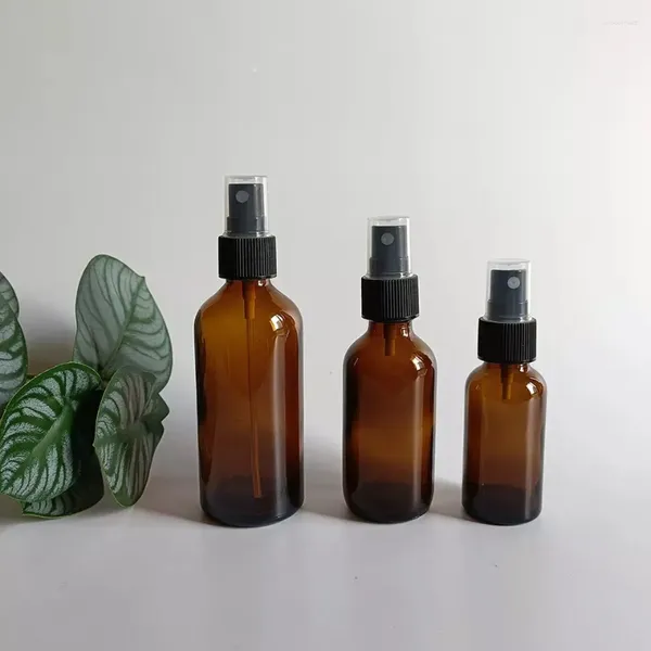 Bouteilles de rangement en gros 5 ml 10 ml 15 ml 20 ml 30 ml 50 ml 100 ml Fondère de pulvérisation de parfum en verre ambre rond avec pulvérisateur de cheveux noirs et