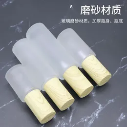 Bouteilles de rangement Yuxi Wood Grain Gracle Glass Glass Crème Bottle Press Press Lotion Spray