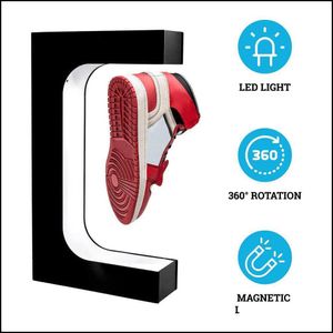Boîtes de rangement Bacs Mode Lévitation Chaussures flottantes magnétiques Présentoir et boutique pour fantaisie Sever avec éclairage LED X0 Zlnewhome Dhl71