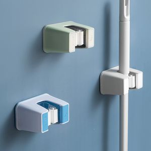 Soportes de almacenamiento Fregona de baño Perforación libre Inodoro Gancho fuerte montado en la pared Soporte para tarjetas Perchero azul RRD6914