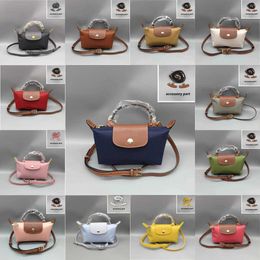 Les sacs à main des magasins sont en vente de dédouanement 95% de réduction 2024 Spring Sag Street Fashion Womens Footography Handbag Dumpling Small Choose Shoder Small Sacs