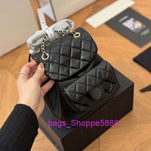 Les magasins vendent une version haute sac à dos en cuir d'origine Xiaoxiang Duma sac à dos petit lingge drawstring bag sac de mouton