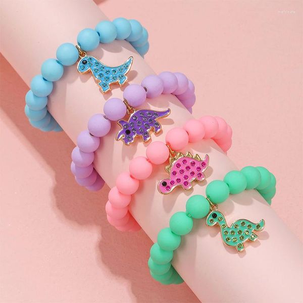 Strand 4 pièces/ensemble bracelets porte-bonheur de dinosaure de dessin animé faits à la main pour filles, bijoux cadeau