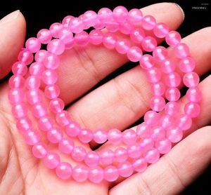 Brazalete de piedras preciosas de cristal de cuarzo de calcedonia rosa natural de Strand 6 mm