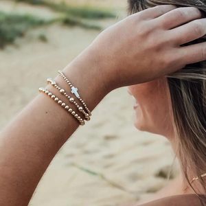 Strand CCGOOD Pulsera con dijes de concha cruzada, joyería elástica, Pulseras de cuentas chapadas en oro de 18 K para mujer, Pulseras minimalistas delicadas para mujer