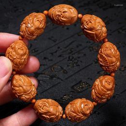 Strand Olive Nut Eight Mammon Master Bracelet sculpté à la main