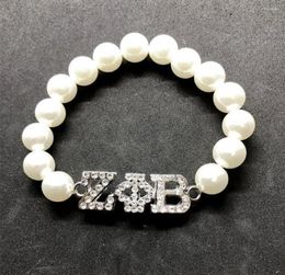 Stron Rhingestone Inralide Greek Letter ZPB Metal Label Charm Zeta Phi Beta Sorority Society Bijoux Simulation Perles de perles Bracelet5029487