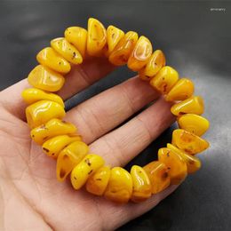 Graisse de poulet jaune brin avec bracelet en cire d'abeille en forme d'ambre