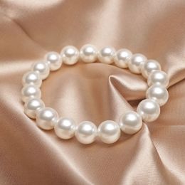 STRANDS Classic Elegant Elastic White Pearl Bracelet For Women Men Men Wedding Banquet Stretched Bracabelets 612 mm kralen Handgemaakte sieradencadeau