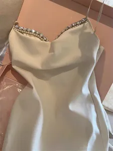 Abito con cinturino 2023 Nuovo abito corto da festa sexy con temperamento sottile Miu / m Premium Pearl Diamond Show