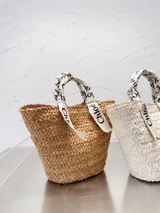 Stro -gevlochten tas Seaside Holiday Straw Tote Grote capaciteit Franse groentemand Zomer Vrijeetporteerbare Vrouw 25 cm