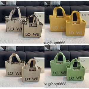 Stro -ontwerper Woody Beach Designer Handtas TOTE TOTE Dames mode hoogwaardige schouder grote capaciteit boodschappentas twee kleurentas originele editie