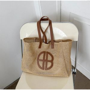 Paille Hollow Out Knitting Tote Sac grande capacité Handmade Handing Handsbag Women Designer Casual Beach Style ethnique 240326