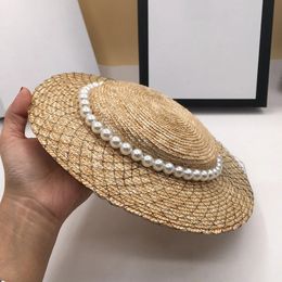 Paille pour dames perlé maille décoration chapeaux de paille rétro de plage de plage de la plage féminine caps d'été gril fashion elelégante