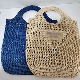 Stro geweven tassen groothandel vrouwelijke landelijke stijl hol geweven schoudertas Europese en Amerikaanse strandhandtassen