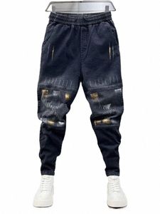 Street Hip Hop Jeans Hommes Grille Couture Harem Pantalons de survêtement Nouveau dans la marque Designer Stackes Pantalons de cowboy en vrac Fi Vêtements E9q0 #