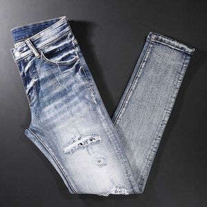 Style de rue mode hommes jean rétro bleu clair élastique coupe ajustée déchiré Patch concepteur Hip Hop Denim Punk crayon pantalon