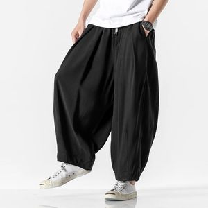 Pantalon de streetwear masque de couleur solide mode homme large pantalon de jambe coréenne