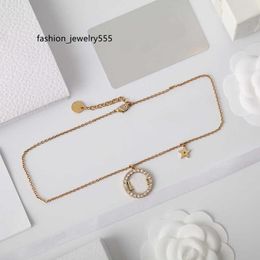 Strings Collares de cadena de diseñador de lujo de moda para mujeres Collar de enlace de plata chapada con collar de colgante de cartera de letras Joyería
