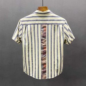 Gestreept shirt met korte mouwen voor het nieuwe product van de zomer, gedrukt patchwork, casual inch shirt, artistieke jeugd, pure katoenen scheur, knap en trendy