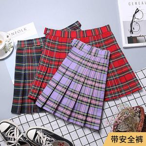 Faldas a rayas Color Contrast Color Versión coreana de la falda plisada Autumn High Wisting Una línea a cuadros Mini falda Estilo de alumno Sweet W091