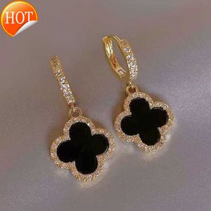 Boucles d'oreilles de créateur Trèfle à quatre feuilles pour femmes senior classique petit vent parfumé or 18 carats lumière luxe flash hommes professeur beau cadeau