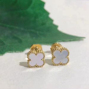 Stud Designer Pendientes de hierba de cuatro hojas Versión alta Pendientes de hierba de la suerte de oro rosa de 18 quilates Pendientes de fritillaria blanca Paty de calcedonia de jade rojo