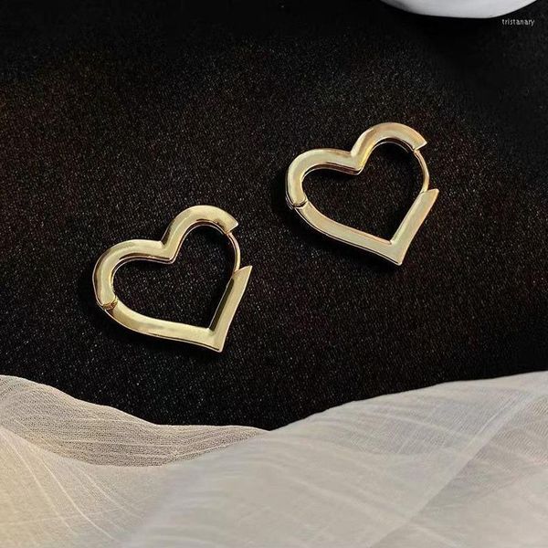 Boucles d'oreilles 1 paire Design argent couleur creux coeur goutte pour les femmes marque mode oreille manchette Piercing balancent boucle d'oreille cadeau