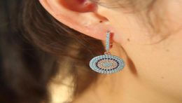 Boucles d'oreilles étalon 2022 de haute qualité belles femmes clip nano bleu micro pave rond charme oreille5532171