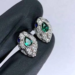 Pendientes de tuerca de plata 925, cabeza de serpiente delicada con ojos azules para mujer, piedra Micro pavimentada CZ, joyería clásica con pendiente de animal