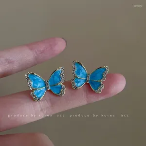 Pendientes de tuerca con forma de mariposa de cristal azul para mujer, joyería coreana 2024