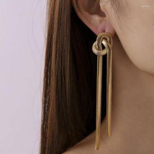 Stud -oorbellen creatieve slang botketen geknoopte gepersonaliseerde goud vergulde koper tassel mode vrouw